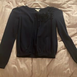 Navy blue sweater with butterfly’s on on side
